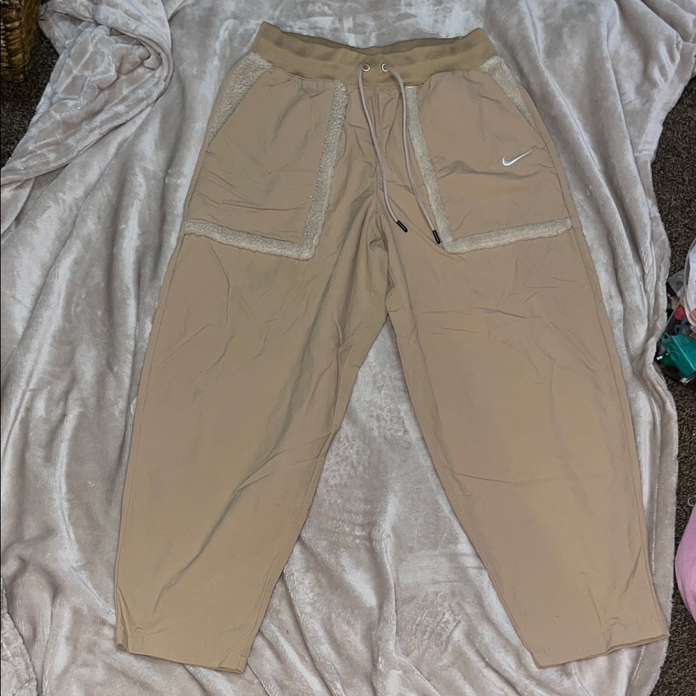 Nike relaxed Beige Joggers with Lace Accents